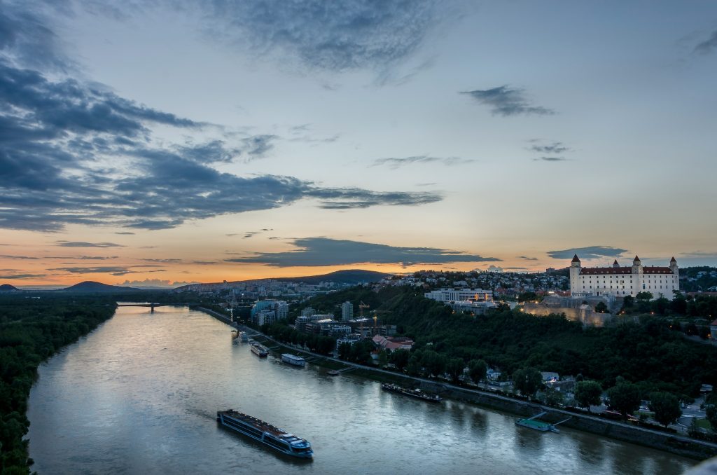 Danube river and Bratislava Castle at summer sunset