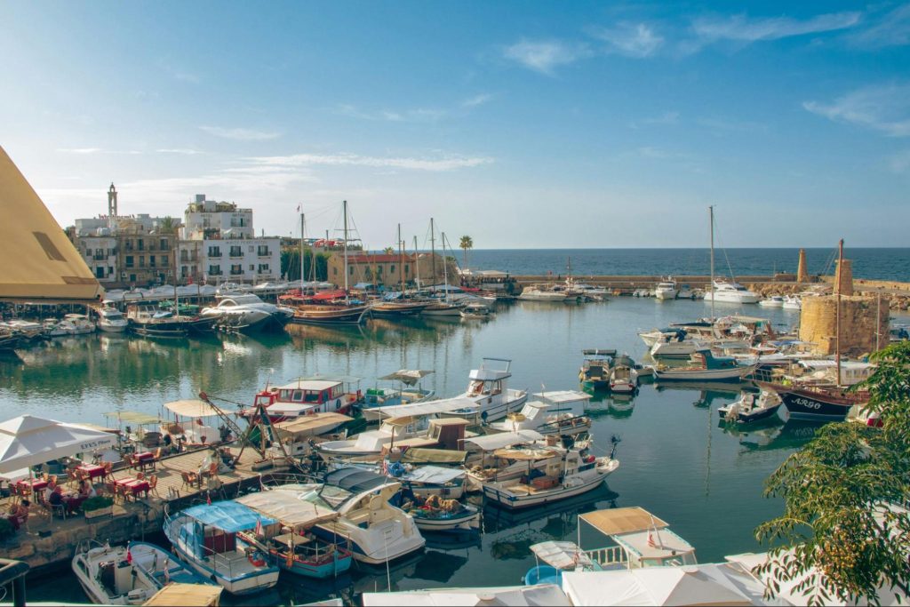 coastal harbour with boats and waterfront buildings