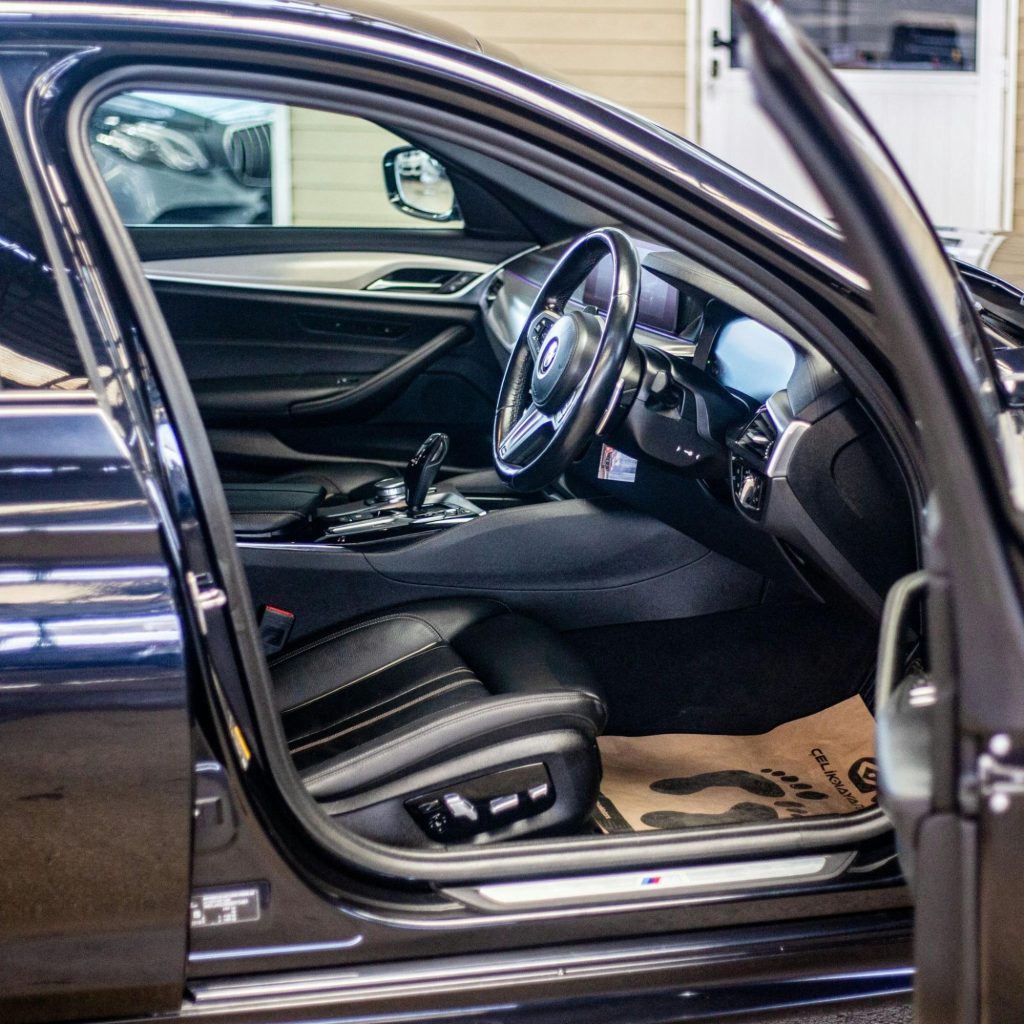 Rental car interior with right-hand steering wheel