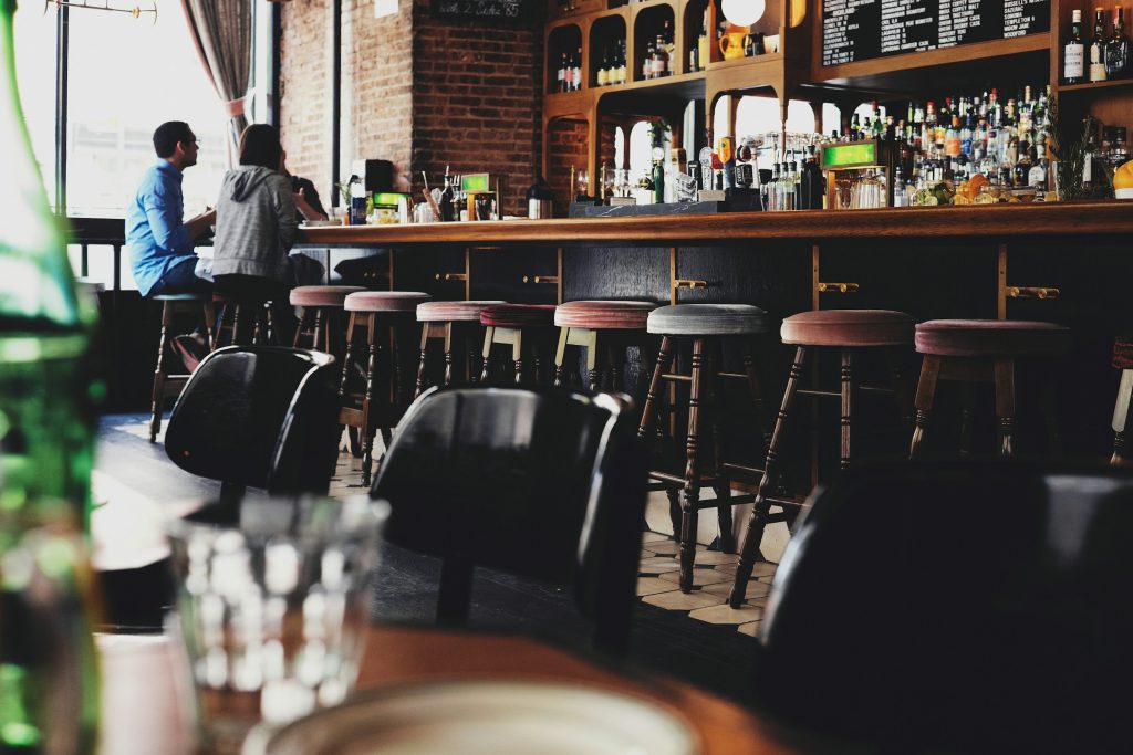 Bar interior with stools and counter service