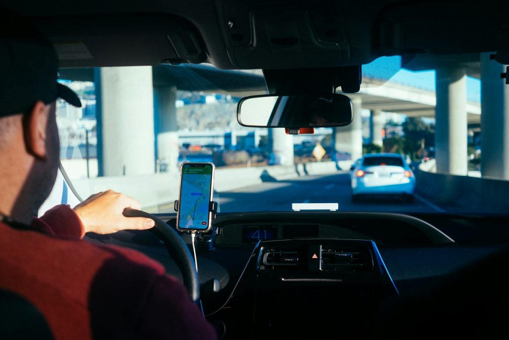 Taxi driver navigating city streets