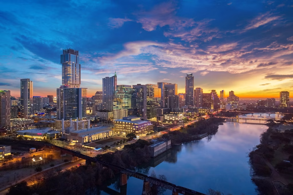 Austin Texas skyline at sunset over Lady Bird Lake